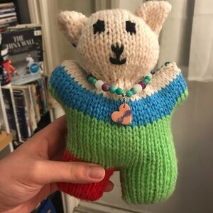 Handmade teddy bear and bracelet